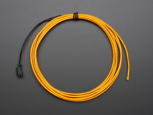 Coil of lit EL wire in yellow