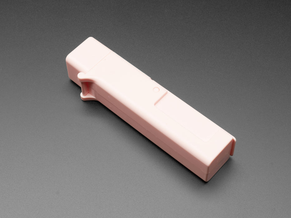 Pink finger pointer shown with compartments open and foam sponge shown inside