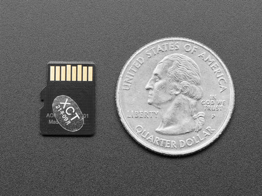 Angled shot of small microSD card 128MB