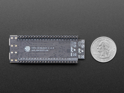 Angled shot of black rectangular microcontroller with a WIFI module.