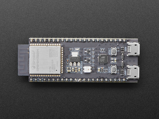 Angled shot of black rectangular microcontroller with a WIFI module.
