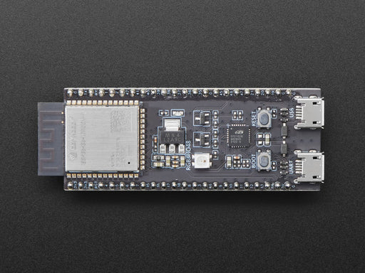 Angled shot of black rectangular microcontroller with a wifi module.