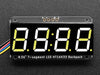 White 7-segment clock display soldered to backpack with all segments lit