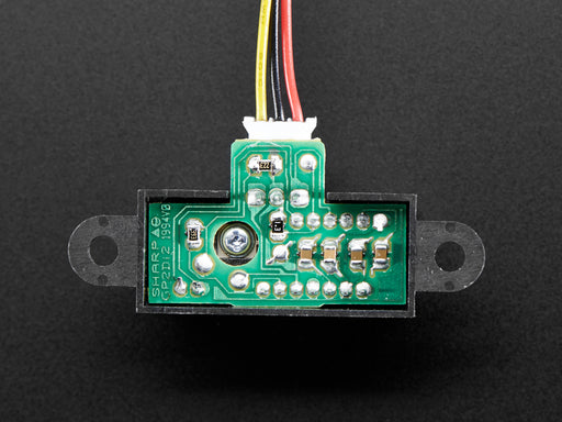 Angled shot of a IR distance sensor with cable.