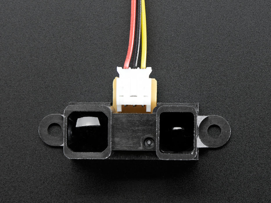 Angled shot of a IR distance sensor with cable.