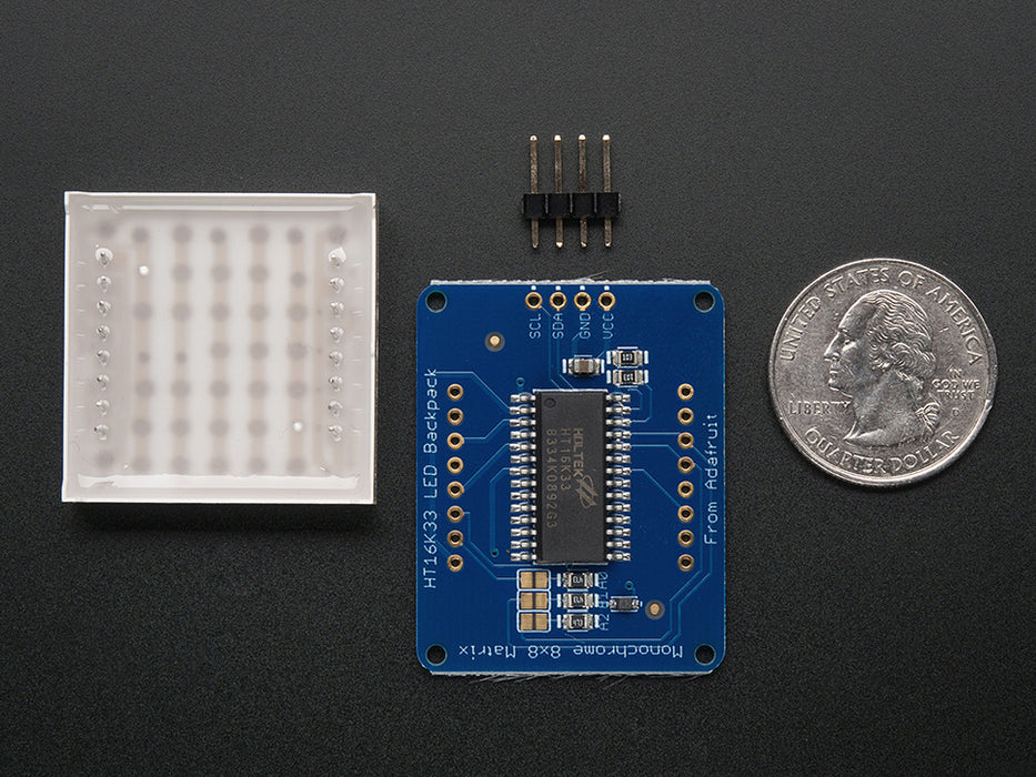 Adafruit Small 1.2" 8x8 Green LED Matrix w/I2C Backpack assembled and powered on. A yellow-green graphic smiley is displayed.