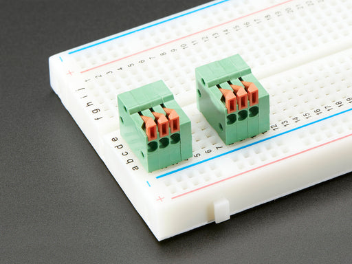 Top view of five Configurable Spring Terminal Blocks - 3 Pin 0.1"