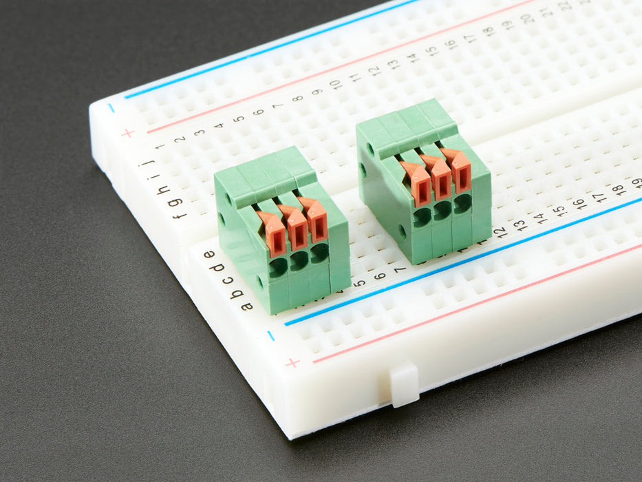 Top view of five Configurable Spring Terminal Blocks - 3 Pin 0.1"