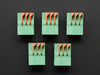 Top view of five Configurable Spring Terminal Blocks - 3 Pin 0.1"