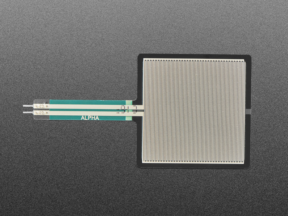 Finger pressing down on square force-sensitive sensor