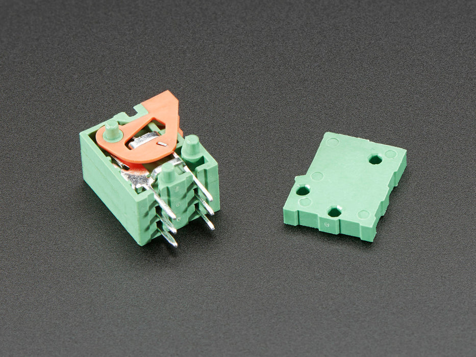 Top view of five Configurable Spring Terminal Blocks - 3 Pin 0.1" Pitch.