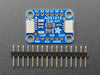 Angled shot of a blue rectangular ADC breakout board.