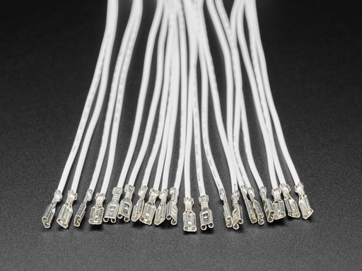 Angled shot of ten 20 cm long quick-connect wire pairs. 