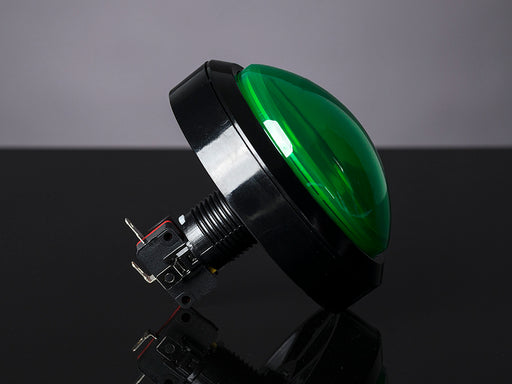 Head-on shot of massive 100mm green arcade button.