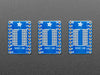 A pair of tweezers holding a SOIC chip hovers over the SMT Breakout PCB for SOIC-20 or TSSOP-20.