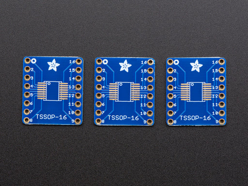 A pair of tweezers holding a microchip hovers over the SMT Breakout PCB for SOIC-16 or TSSOP-16.