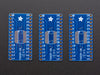 A pair of tweezers holding a microchip hovers over the SMT Breakout PCB for SOIC-28 or TSSOP-28.