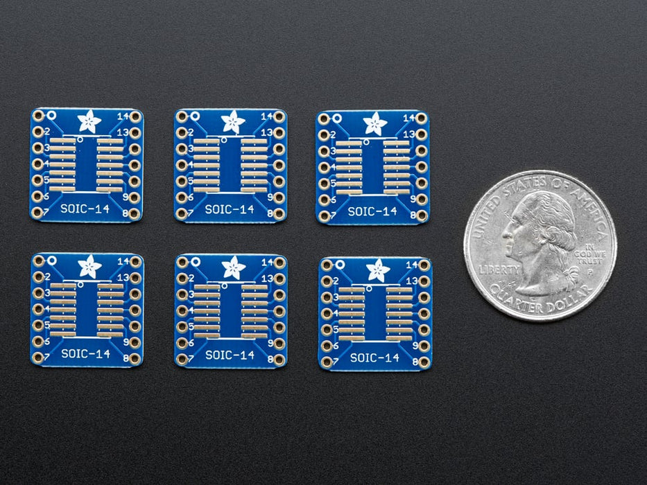 A pair of tweezers holding a microchip hovers over the SMT Breakout PCB for SOIC-14 or TSSOP-14.