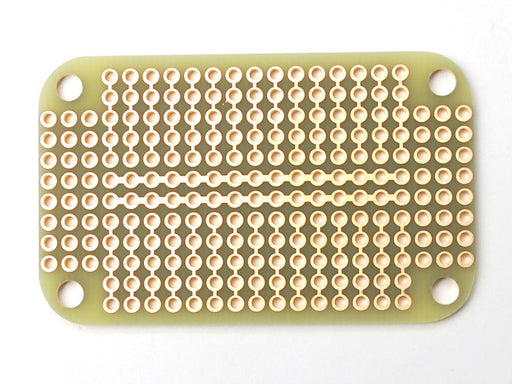 Top view of a small Altoids breath mint case with two Adafruit Perma-Proto Small Mint Tin Size Breadboard PCBs.