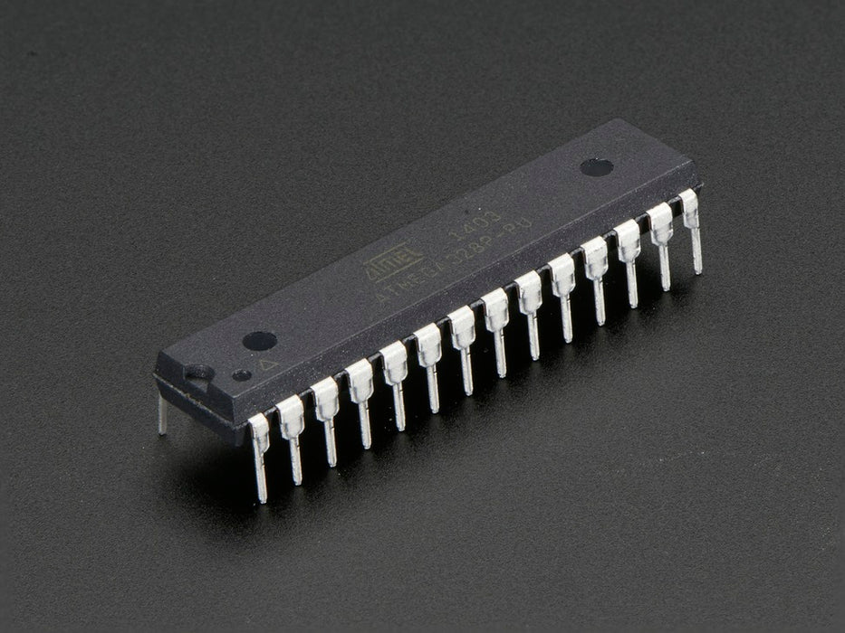 Angled shot of a Arduino bootloader-programmed chip. 