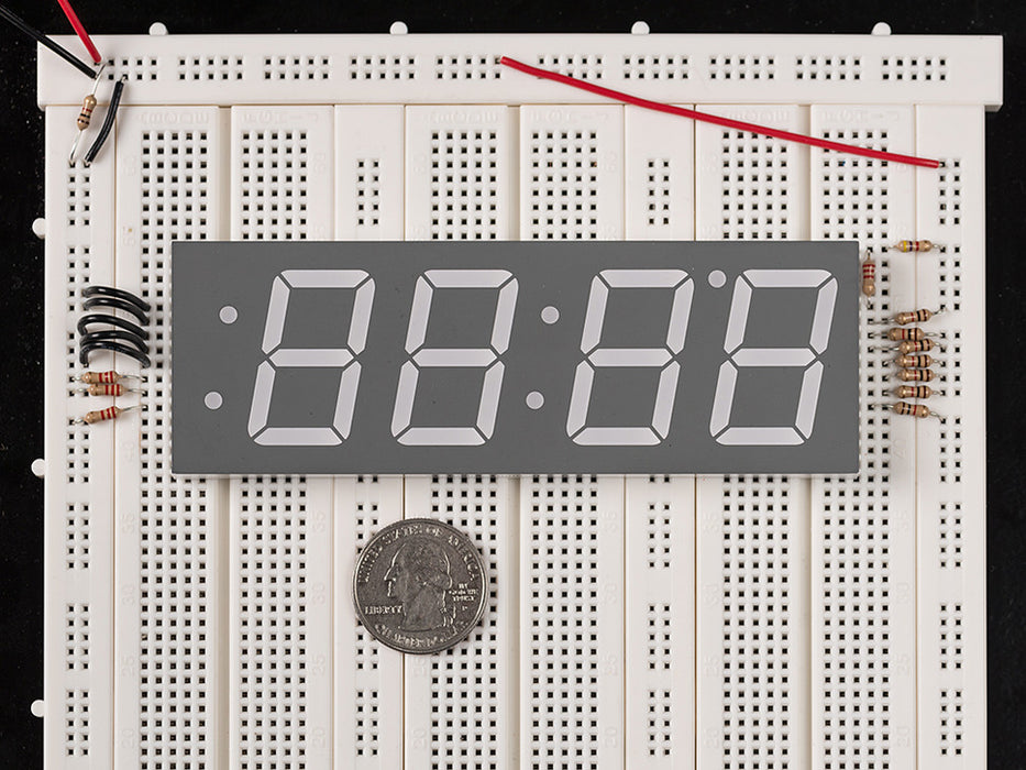 Huge red 7-segment clock display with all segments lit