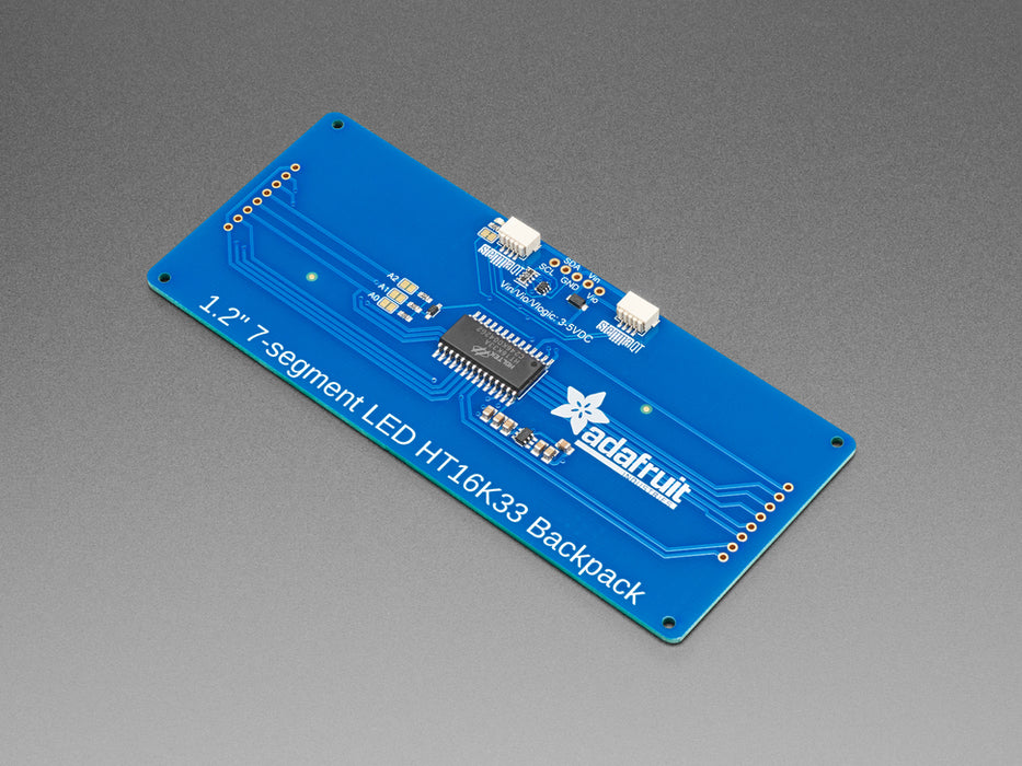 Huge yellow 7-segment clock display soldered to backpack with all segments lit