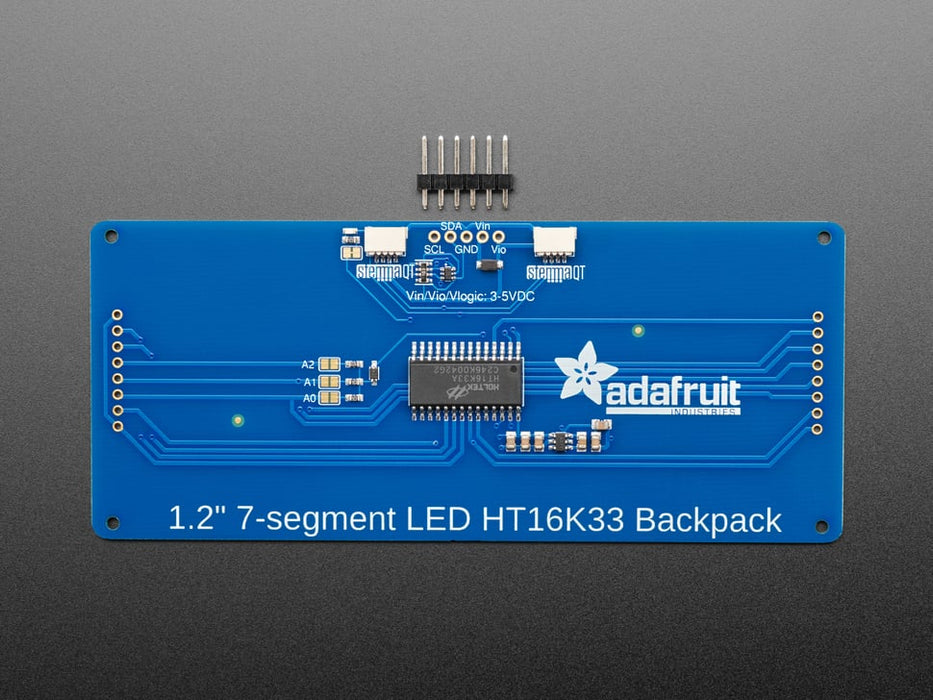 Huge yellow 7-segment clock display soldered to backpack with all segments lit