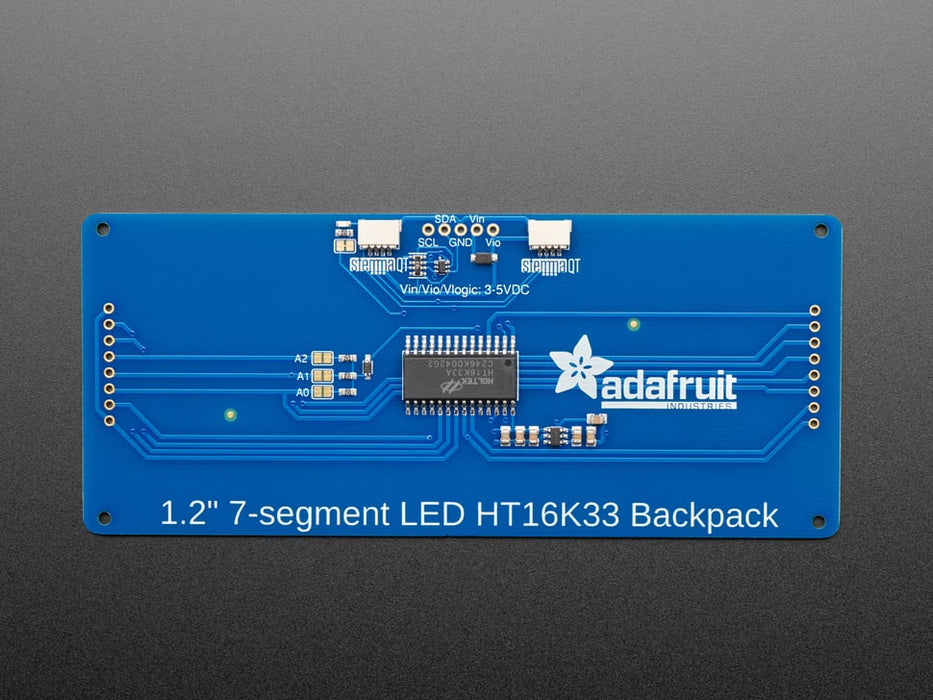 Huge yellow 7-segment clock display soldered to backpack with all segments lit