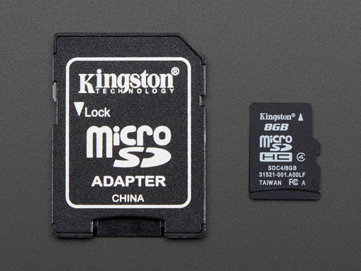 Hand removing/installing micro SD card from SD adapter