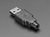 Angled shot of an assembled USB DIY Connector Shell with a Type A Male Plug. The male plug faces the camera at an angle.