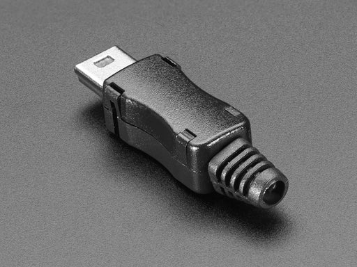 Angled shot of an assembled USB DIY Connector Shell with a Type Mini-B Plug. The male plug faces the camera at an angle.