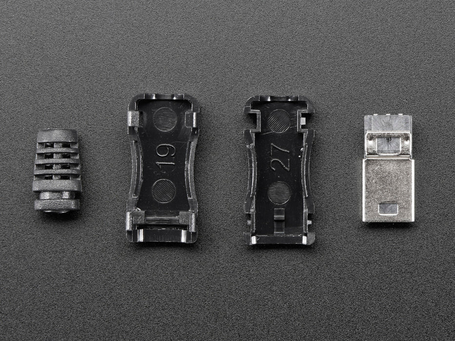 Angled shot of an assembled USB DIY Connector Shell with a Type Mini-B Plug. The male plug faces the camera at an angle.
