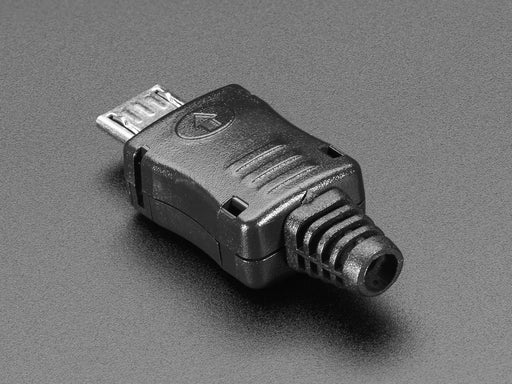 Angled shot of an assembled USB DIY Connector Shell with a Type Micro-B Plug. The male plug faces the camera at an angle.