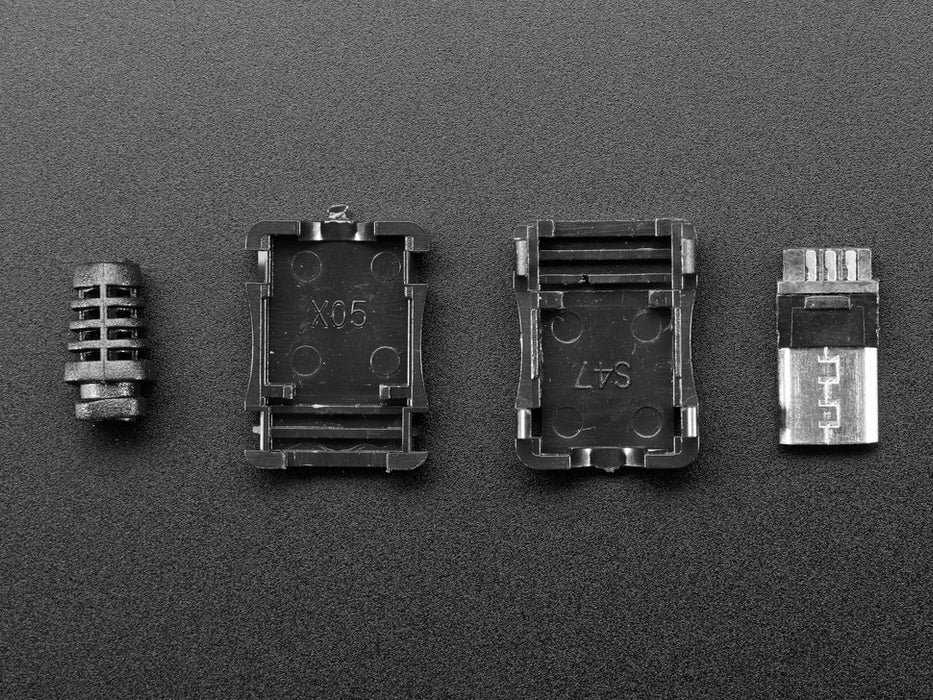 Angled shot of an assembled USB DIY Connector Shell with a Type Micro-B Plug. The male plug faces the camera at an angle.