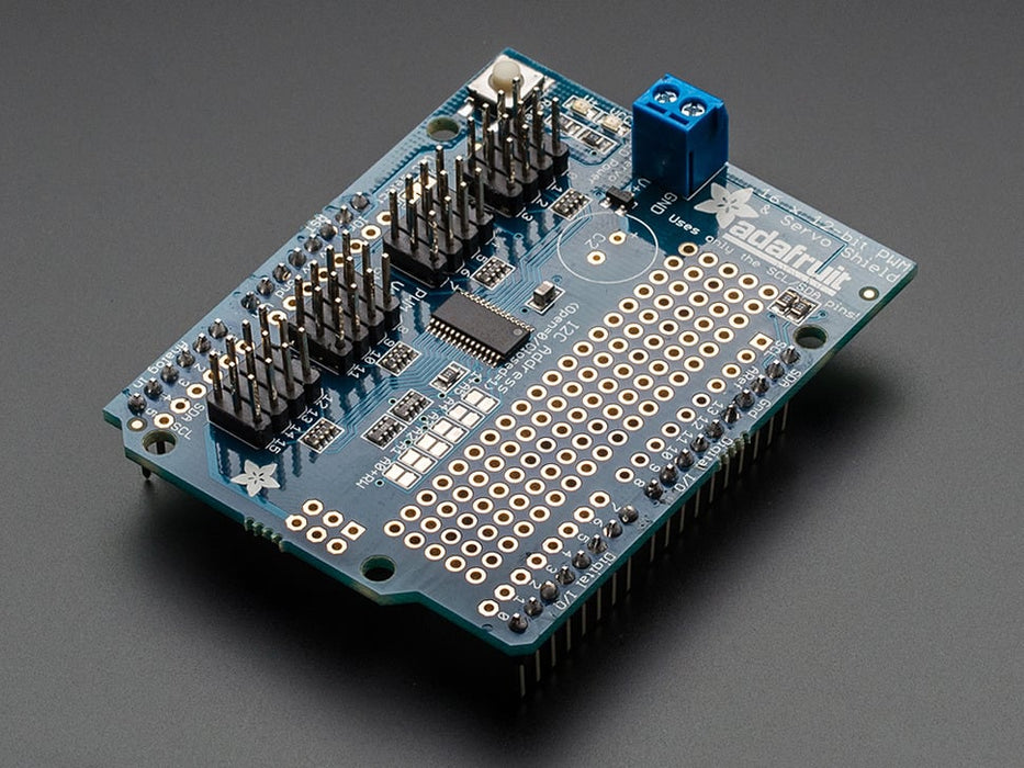 Top down view of a Adafruit 16-Channel 12-bit PWM/Servo Shield - I2C interface connected to 16 servos. 