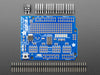 Top down view of a Adafruit 16-Channel 12-bit PWM/Servo Shield - I2C interface connected to 16 servos. 