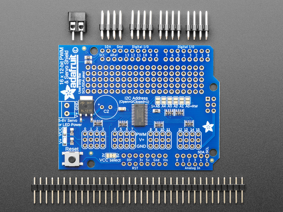 Top down view of a Adafruit 16-Channel 12-bit PWM/Servo Shield - I2C interface connected to 16 servos. 