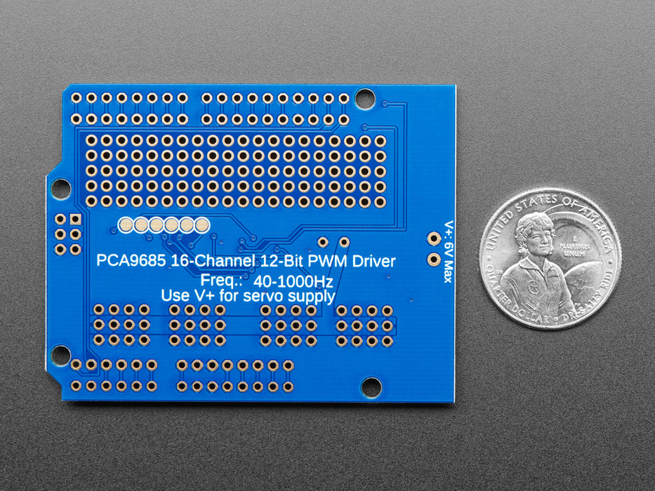 Top down view of a Adafruit 16-Channel 12-bit PWM/Servo Shield - I2C interface connected to 16 servos. 