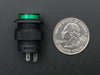 Angled shot of a green 16mm illuminated pushbutton. 