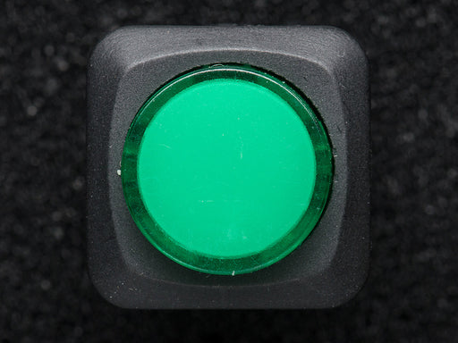 Angled shot of a green 16mm illuminated pushbutton. 