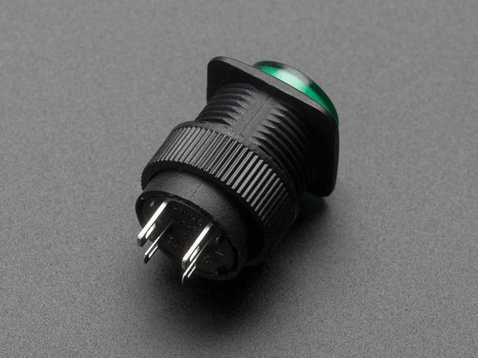 Angled shot of a green 16mm illuminated pushbutton. 