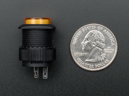 Angled shot of a yellow 16mm illuminated pushbutton. 