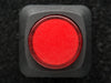 Angled shot of a red 16mm illuminated pushbutton. 