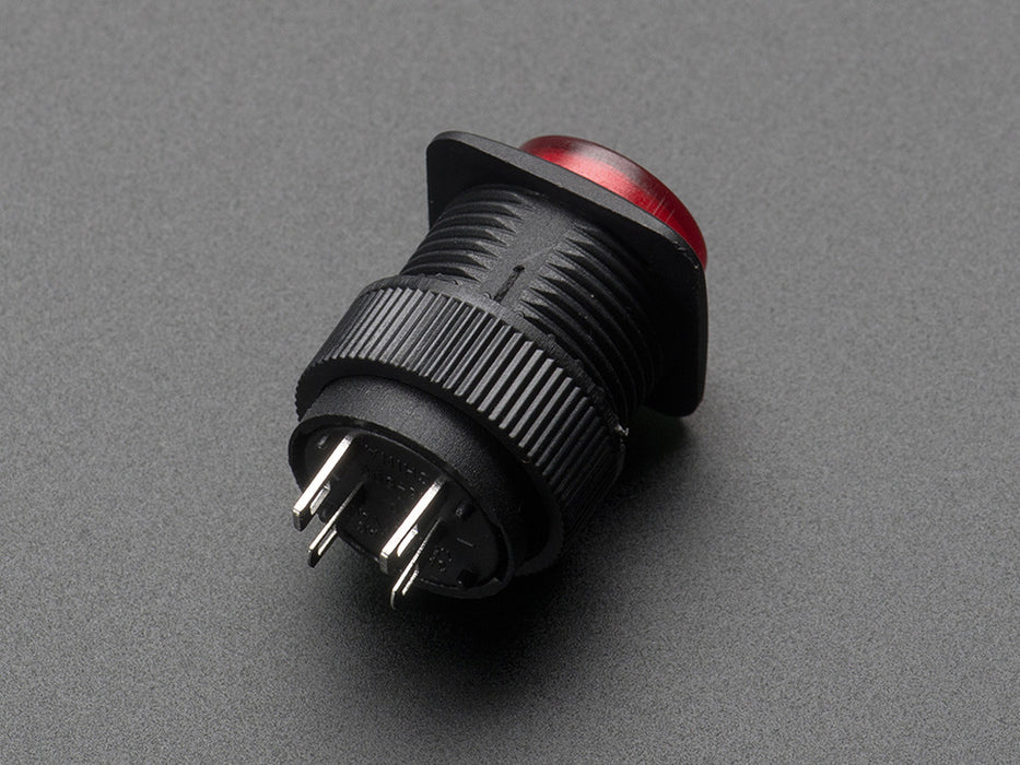 Angled shot of a red 16mm illuminated pushbutton. 