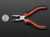 Red and black needle-nose pliers