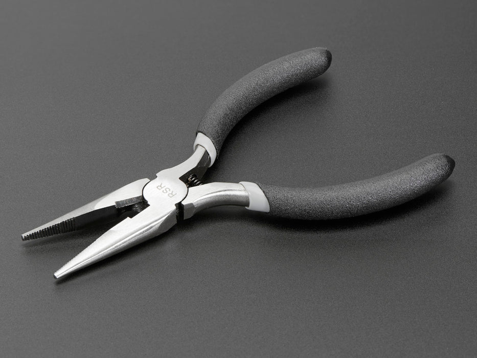 Red and black needle-nose pliers