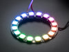 Hand holding NeoPixel Ring with 16 x 5050 RGB LED, lit up rainbow