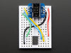 Assembled 6-pin ISP breakout with all headers soldered on.