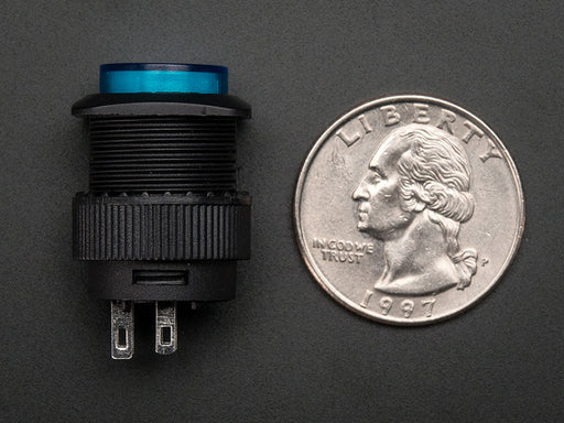 Angled shot of a blue round 16mm illuminated pushbutton. 