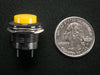 Angled shot of 16mm yellow panel mount pushbutton.